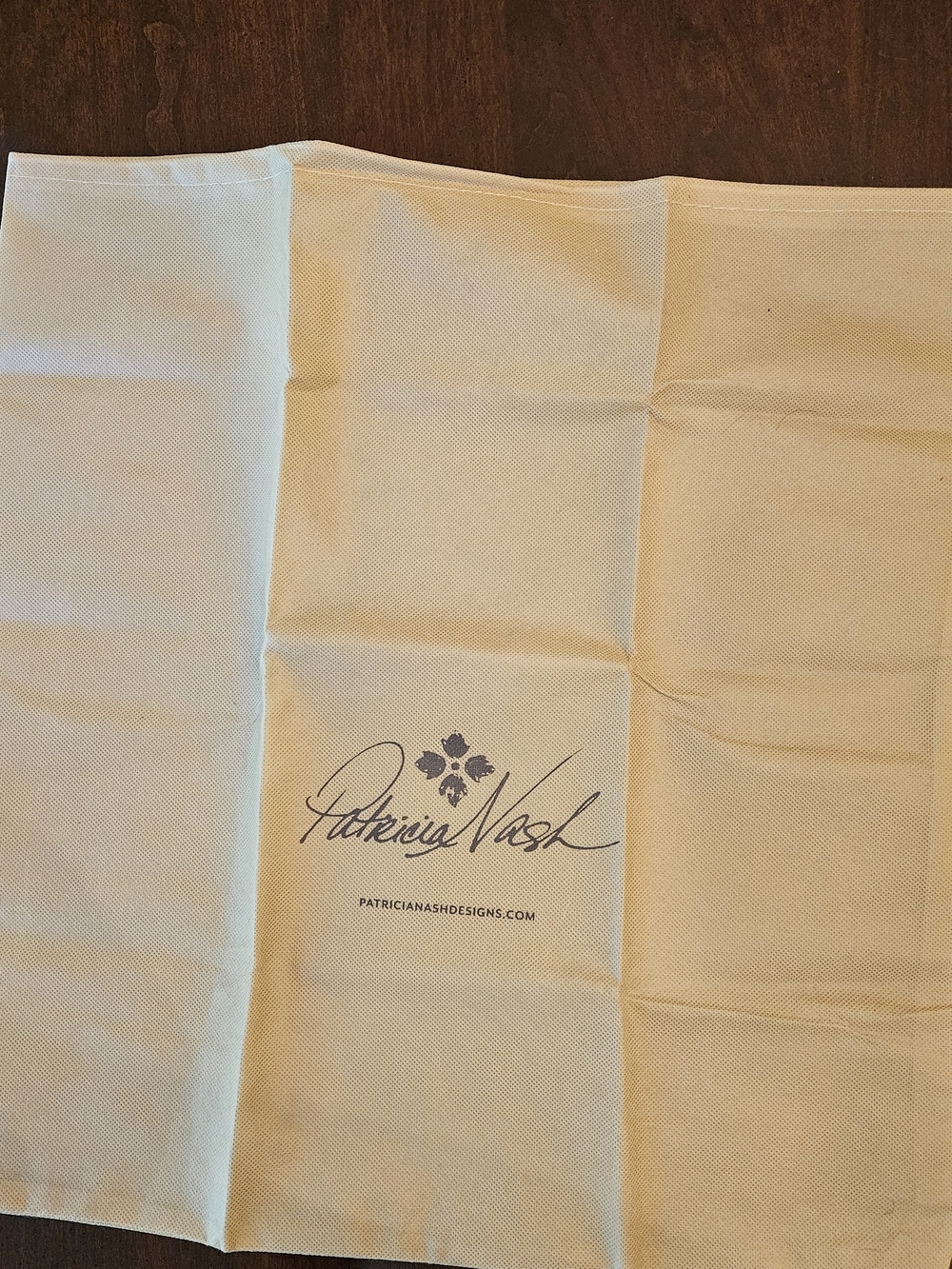 Patricia Nash Cream Dust Cover with Navy Logo